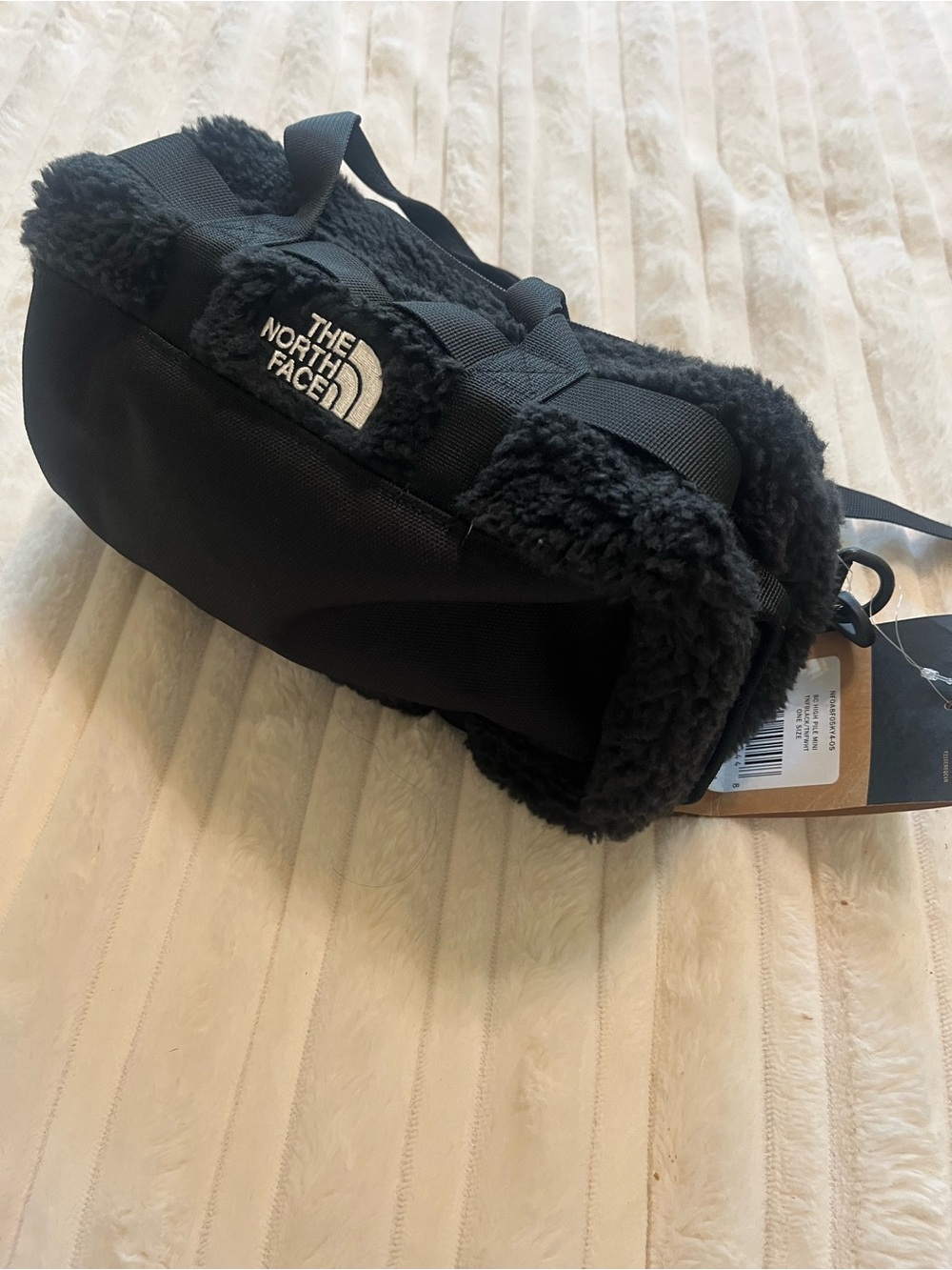 The North Face Black Sherpa-Trim mini bag/backpack